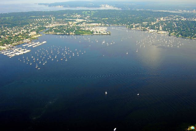 An aerial view of a marina with lots of boats in the water